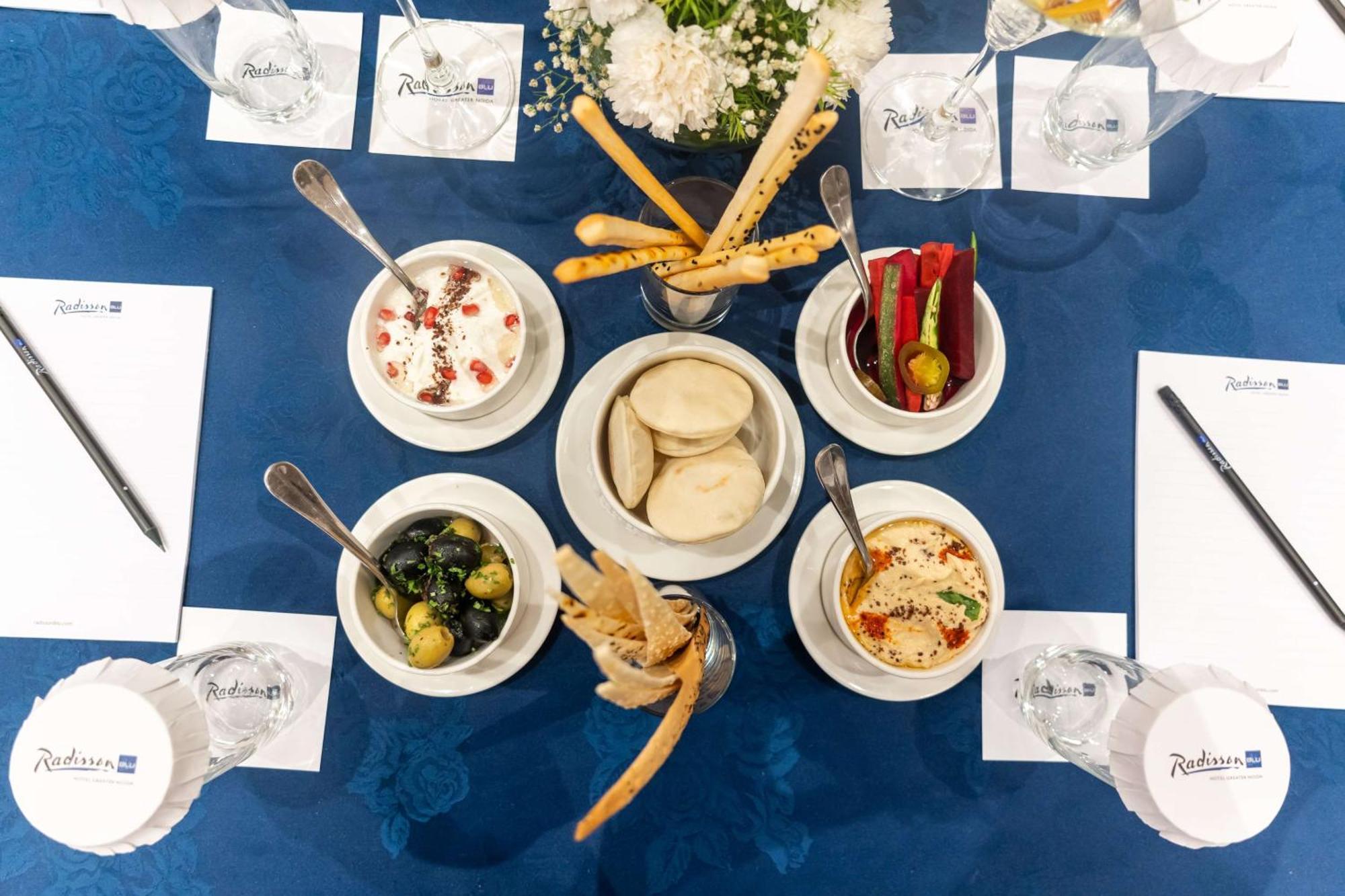 Radisson Blu Hotel, Greater Noida Zewnętrze zdjęcie A selection of Israeli snacks